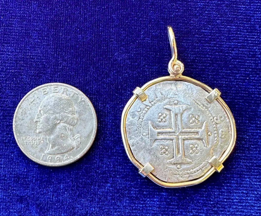 Silver Portuguese 100 REIS "TOSTAO" set in a custom hand made 14K GOLD pendent.