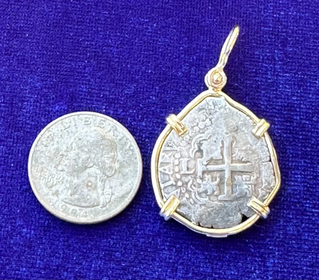 2 Reales Cob set in a custom hand made 14K GOLD pendent.