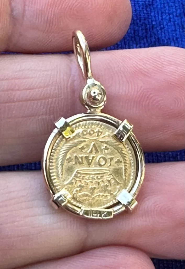 GOLD 400 REIS DATED 1720 set in a custom hand made 14K GOLD pendent.